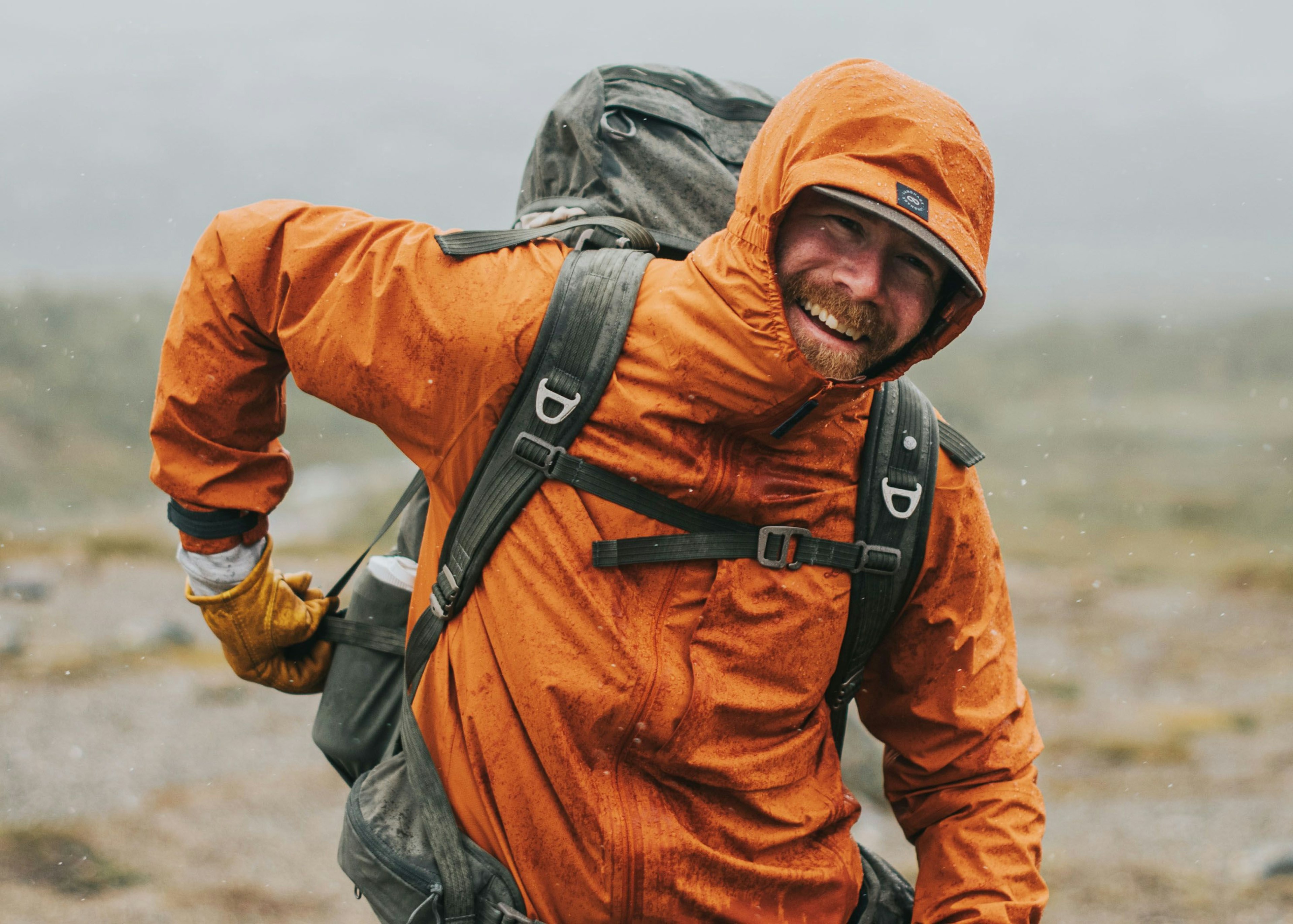 Man laughing outdoors