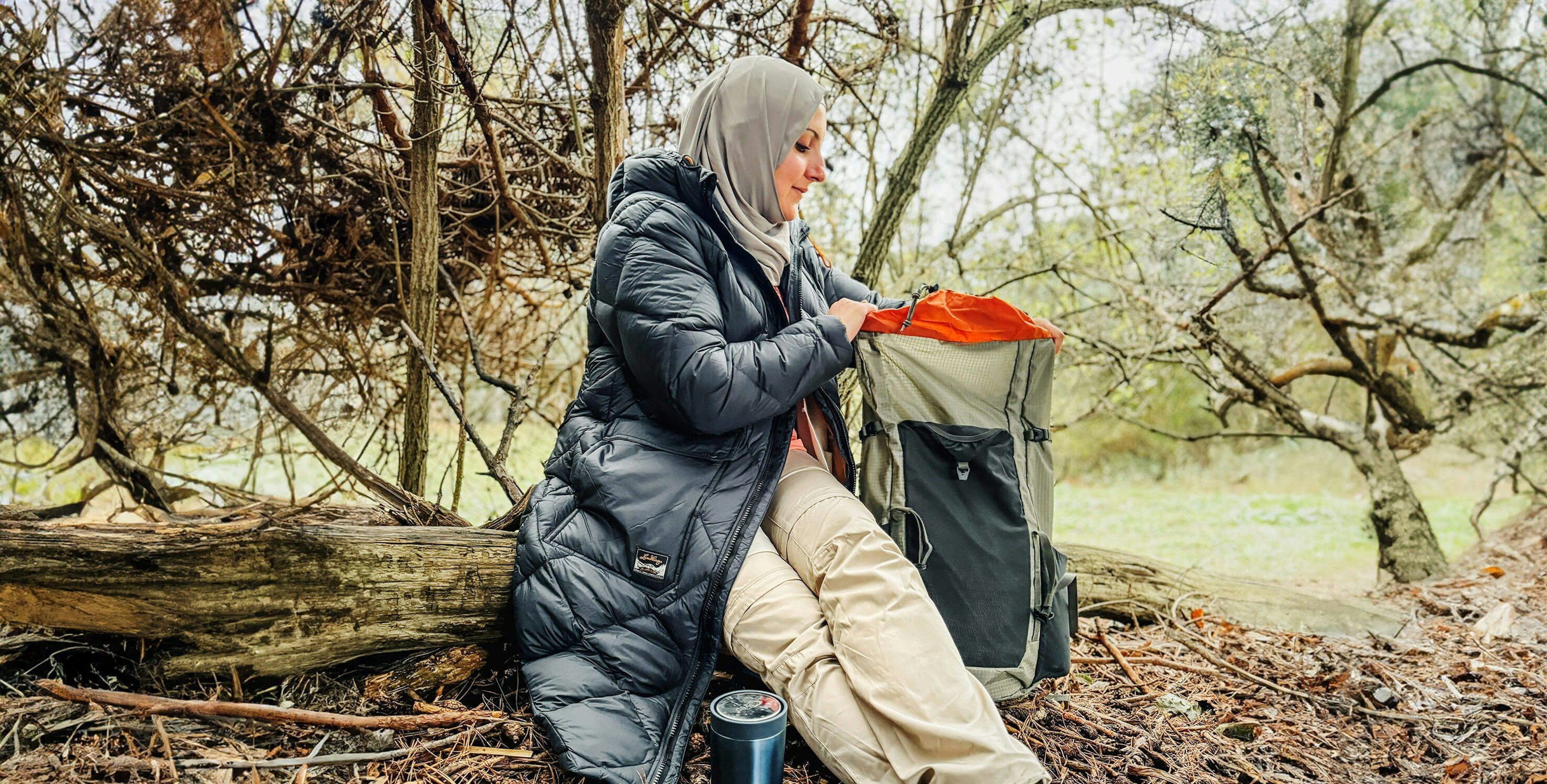 woman sitting in the woods