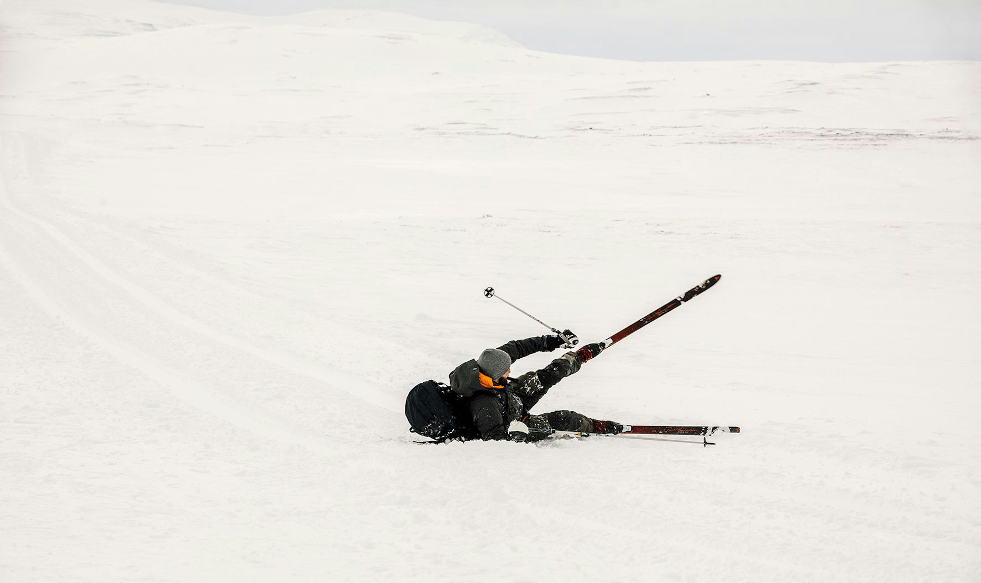 person falling in the snow