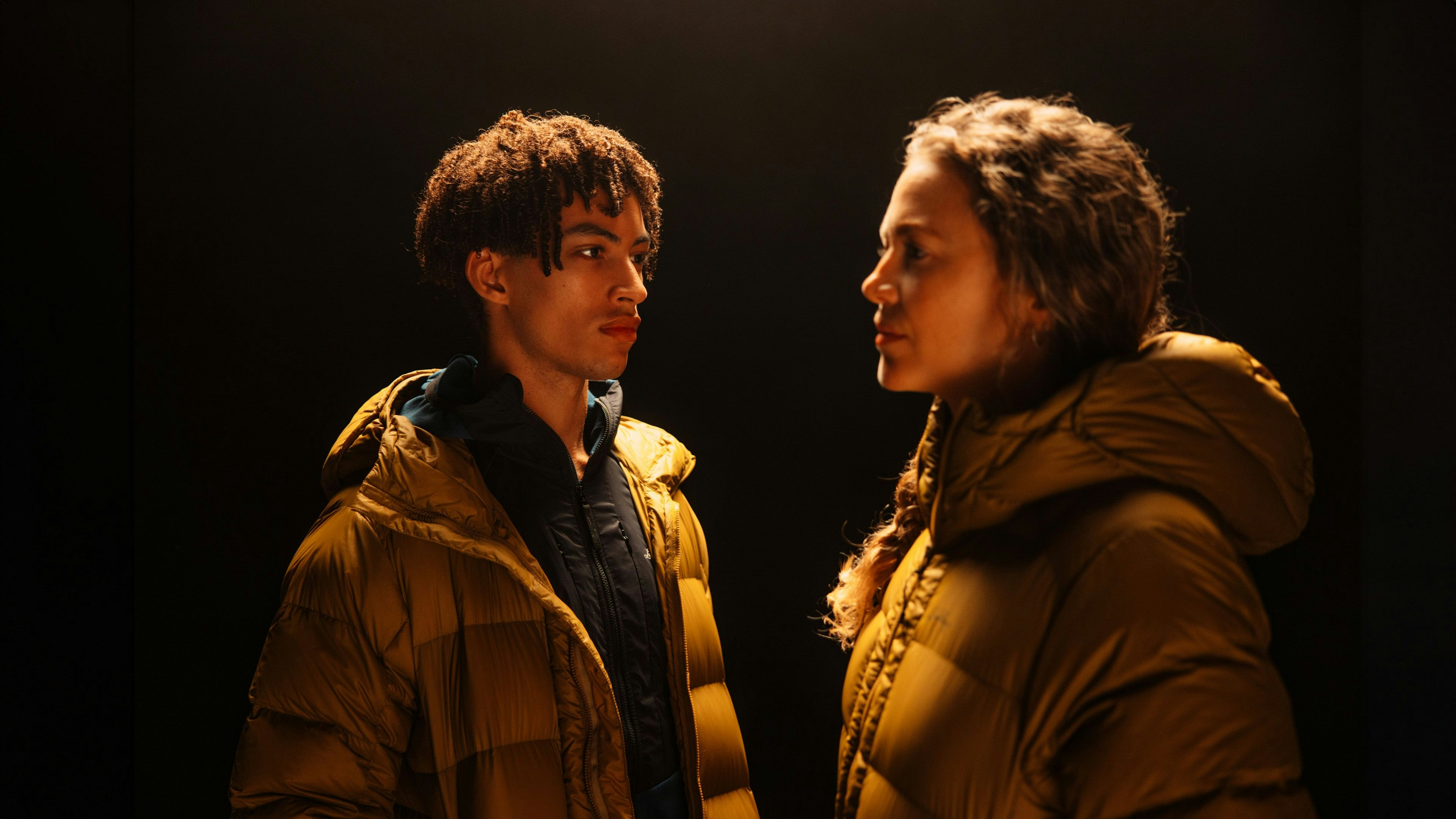 Man hiking in winter mountains