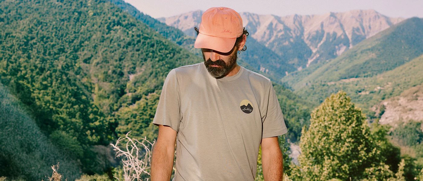 Men laying resting on a frozen lake