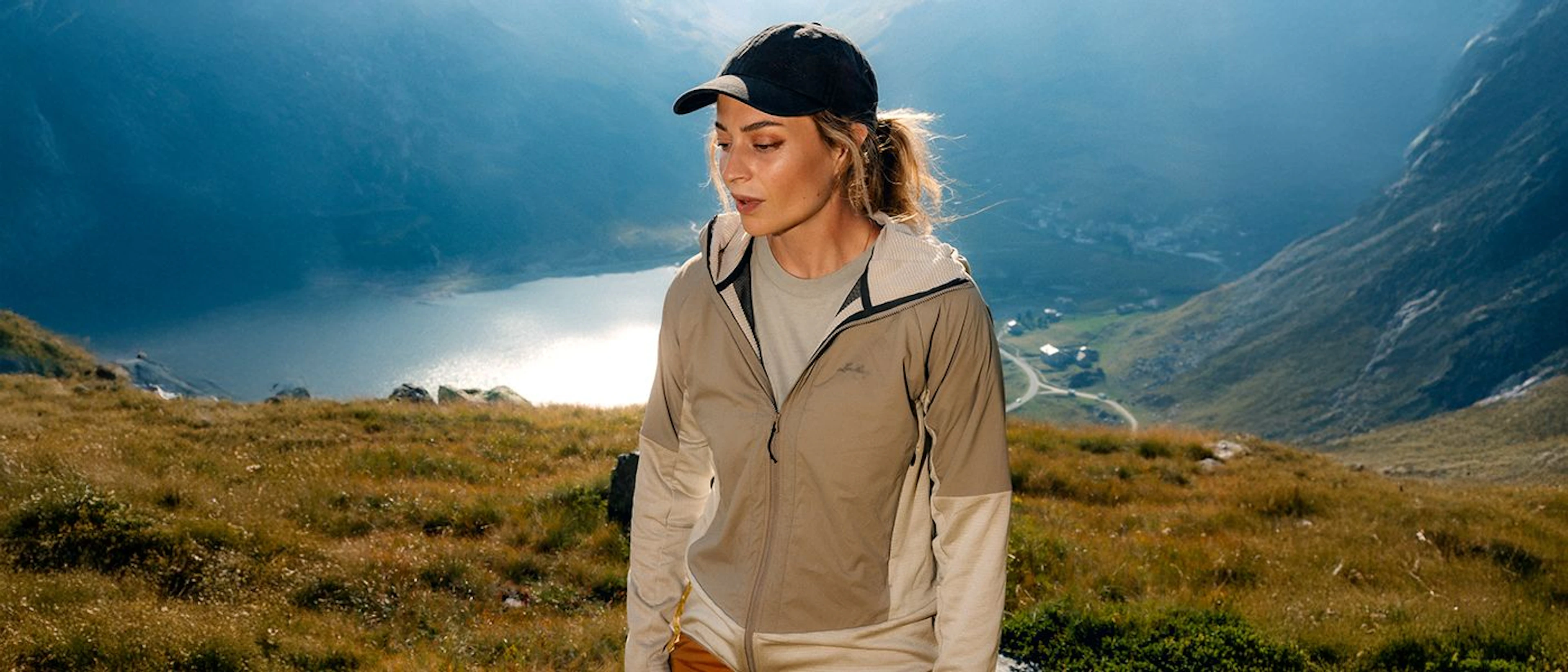 Men laying resting on a frozen lake