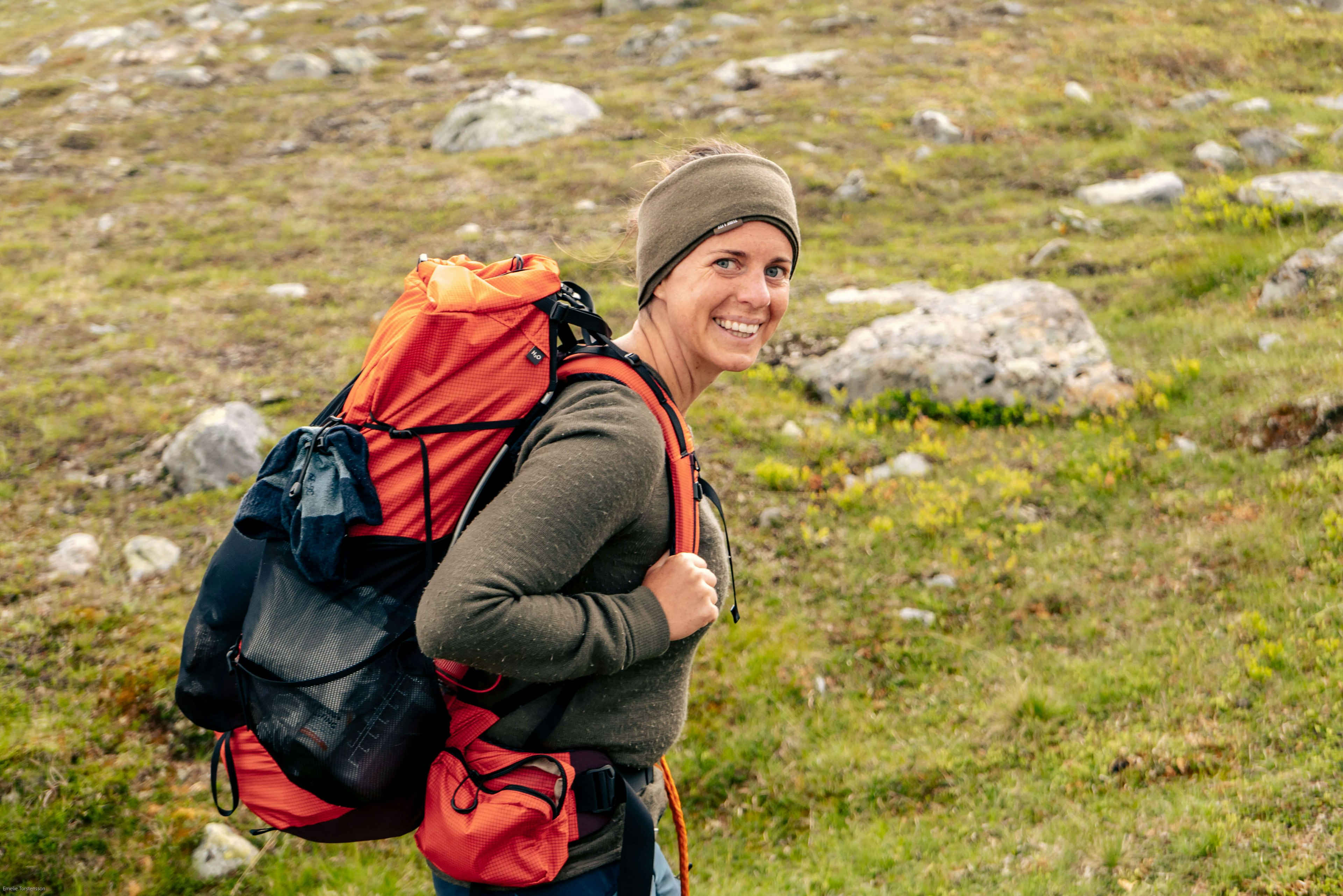 happy woman with backpack