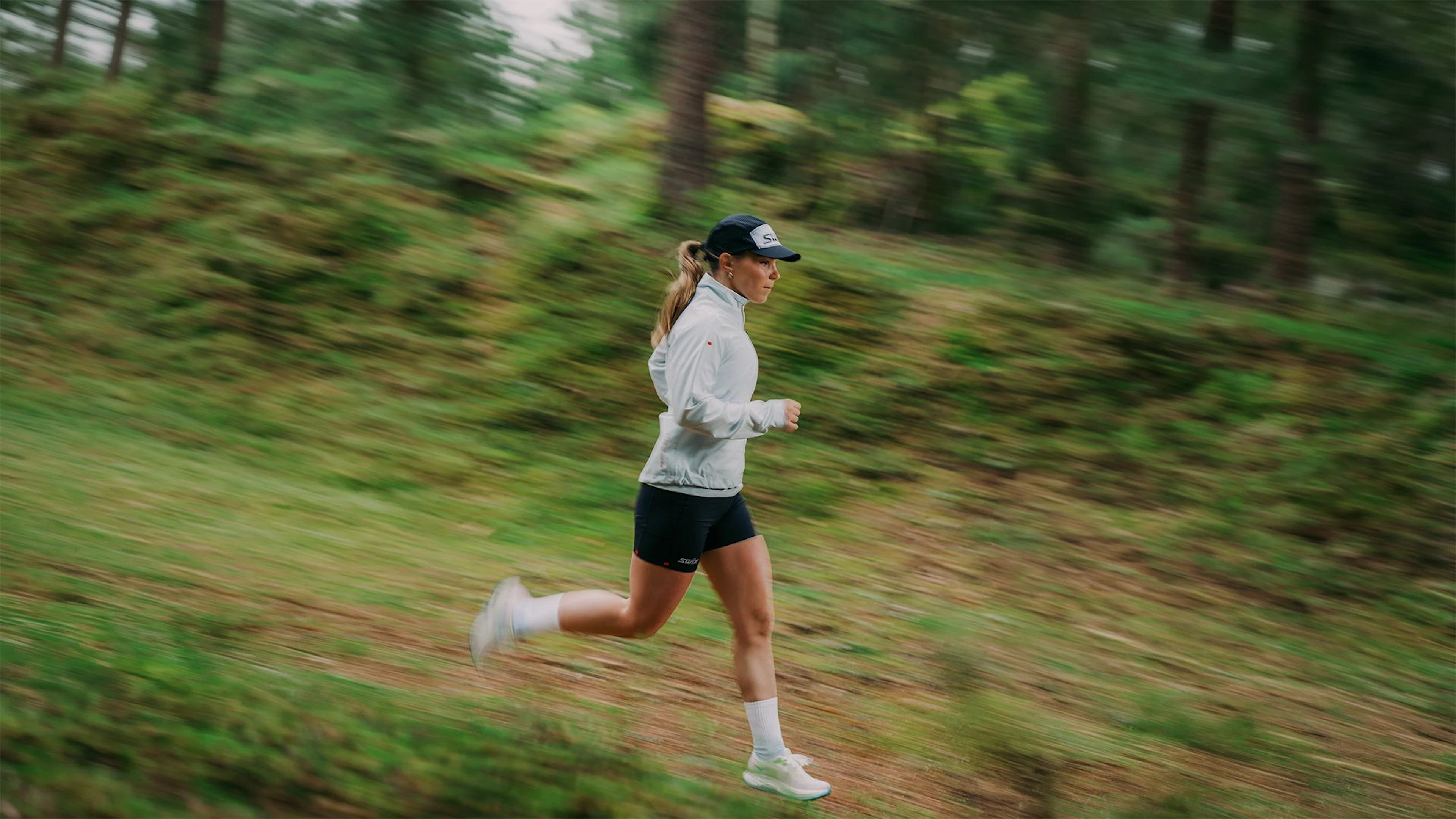 Woman running in Swix clothing